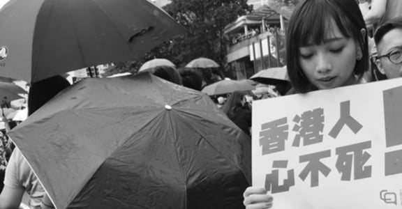 一個台灣女生在香港遊行現場：他們說謝謝台灣人，但我們知道自己謝謝香港人  