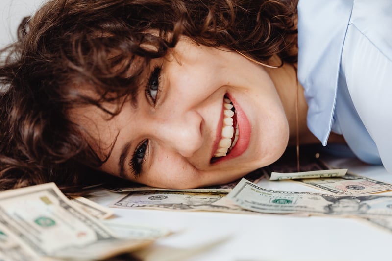 smiling with money